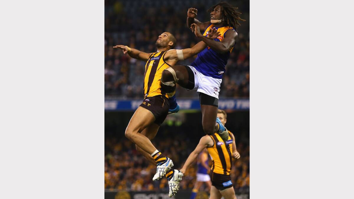 West Coast's Nic Naitanui flies for a mark against Hawthorn. Photo: Getty Images.