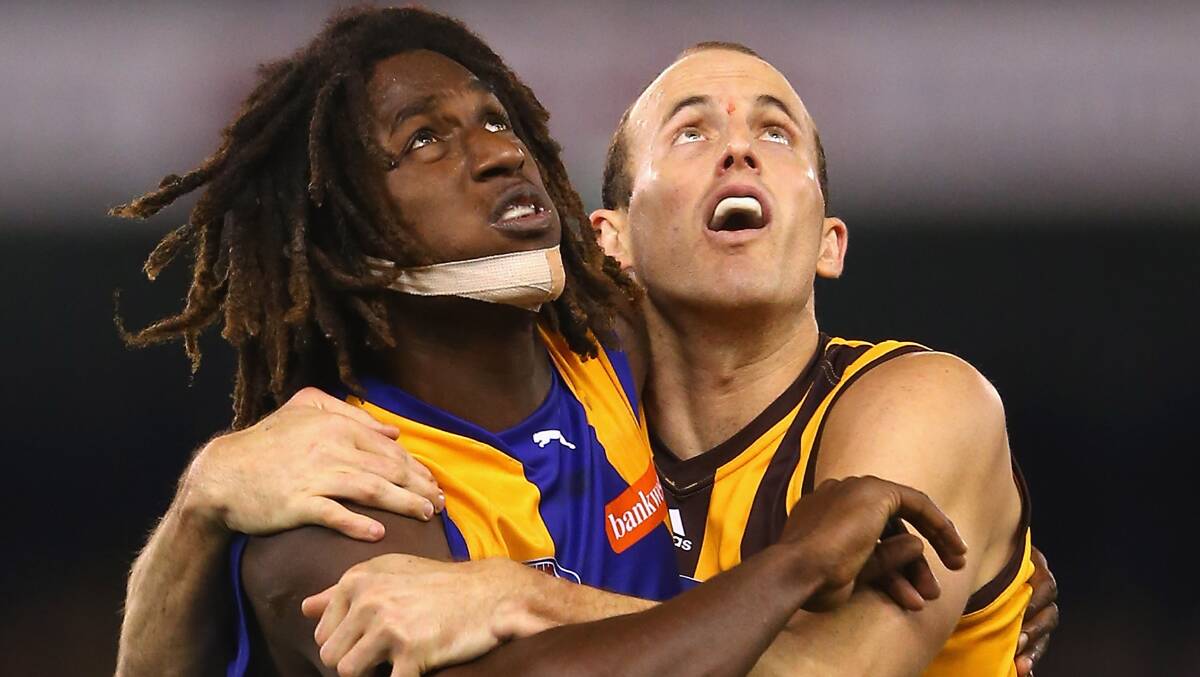 Nic Naitanui and David Hale compete in the ruck. Photo: Getty Images.