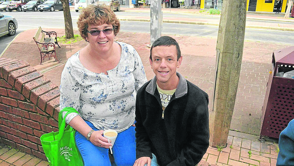 LEFT: Support worker Debbie Taylor and Shane Smith at LFE’s morning tea.         (LFE 013)