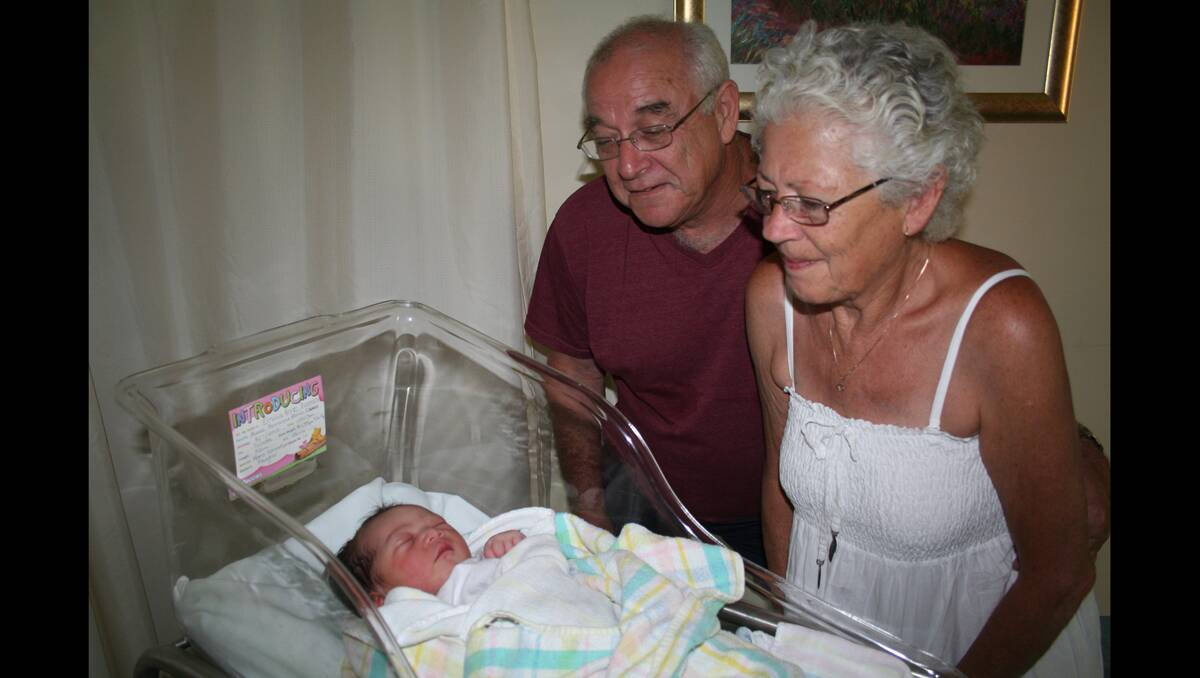 NEW YEAR BABY: Doting grandparents Ronald and Jennifer Roelofs welcome the latest addition to the family, Emilia Anne Thomson who is Young’s first baby for 2013, born on January 8, to Jennie Thomson and Aloisio Faaea. (babythomson 02)