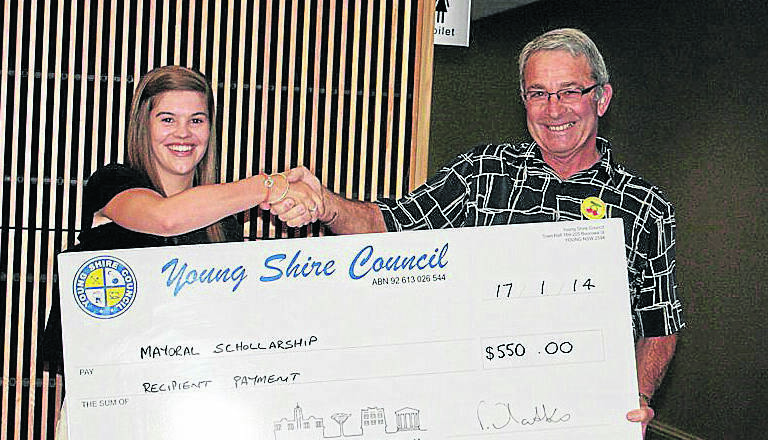 ABOVE LEFT: Stephanie Hall receives her cheque.     				                    (mayoralscholar4)