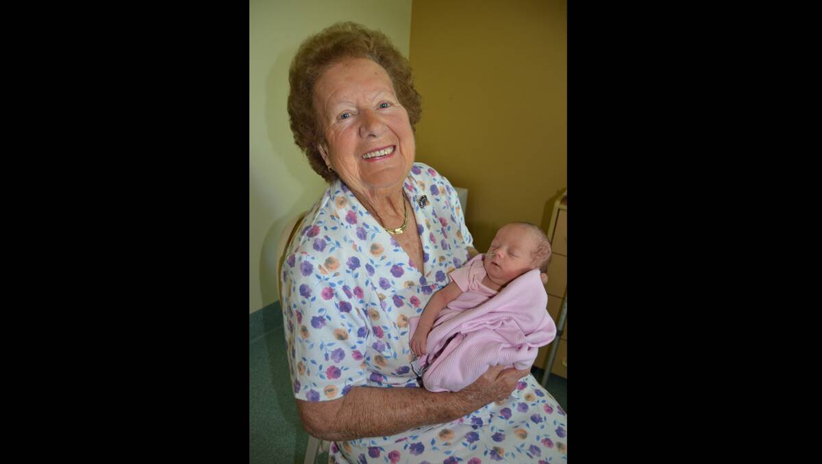 Kate Aston was born five weeks premature on Wednesday, January 16, at Canberra Hospital, weighing 2190 grams and measuring 46 centimetres. She is the granddaughter of Lyn and Maurice Aston of Thuddungra and the great granddaughter of Elsie Aston of Young. Baby Kate is pictured with her great-grandmother Elsie.