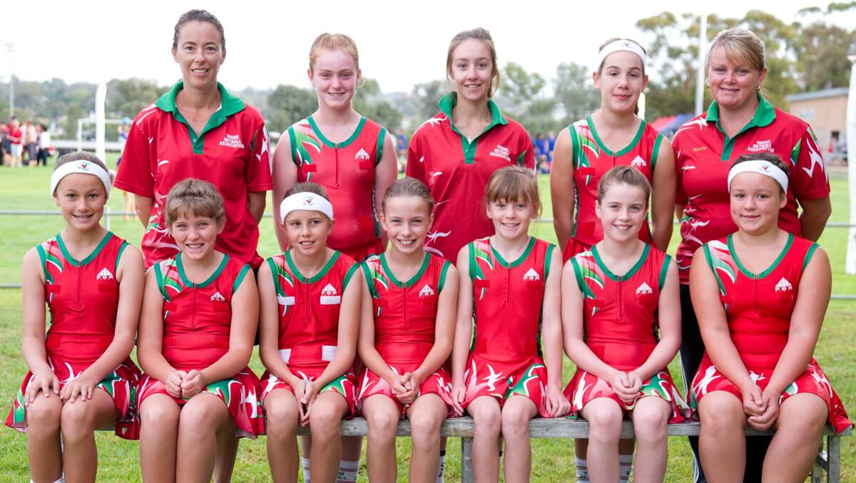 UNDER 11S: Young’s Under 11 rep netball team head into their final games of the season against Parkes and Cootamundra where they hope to snatch themselves a first or second place. Coach: Amanda Nicolls. Manager: Nat Maddams. Assistant Coach: Katelyn Smith-Nicolls. Back, left to right: Amanda Nicolls, Sarah Penfold, Katelyn Smith-Nicolls, Tylah-Jane Dal Molin, Nat Maddams; Front, left to right: Brooke Windsor, Hannah Barrett, Rachael Walker, Molly Thackerary, Bridie Minehan, Gypsie Potts and Courtney Petherbridge. 			Photo: Classique Imagerie Studio.