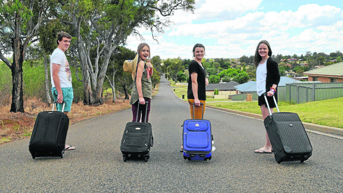 EXCITED: Hennessy Catholic College student Matt Mitchell, Young High School’s Shannon Meyer, and Hennessy’s Rose and Claire Parker are keen to pack their bags and head off on their much anticipated schoolies trip next week. 		  (schoolies 008)