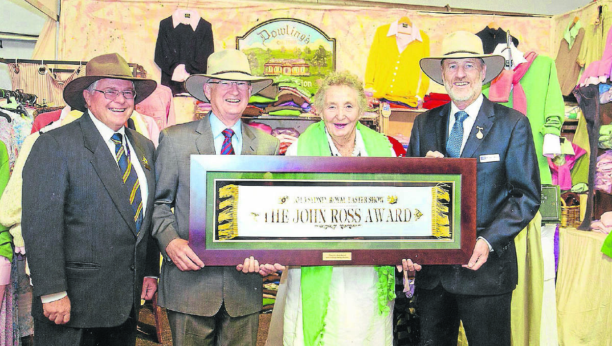 AWARD: Mrs Judy Dowling is presented with the John Ross Award at her stand in the Fashion and Style Pavilion.   (sub)