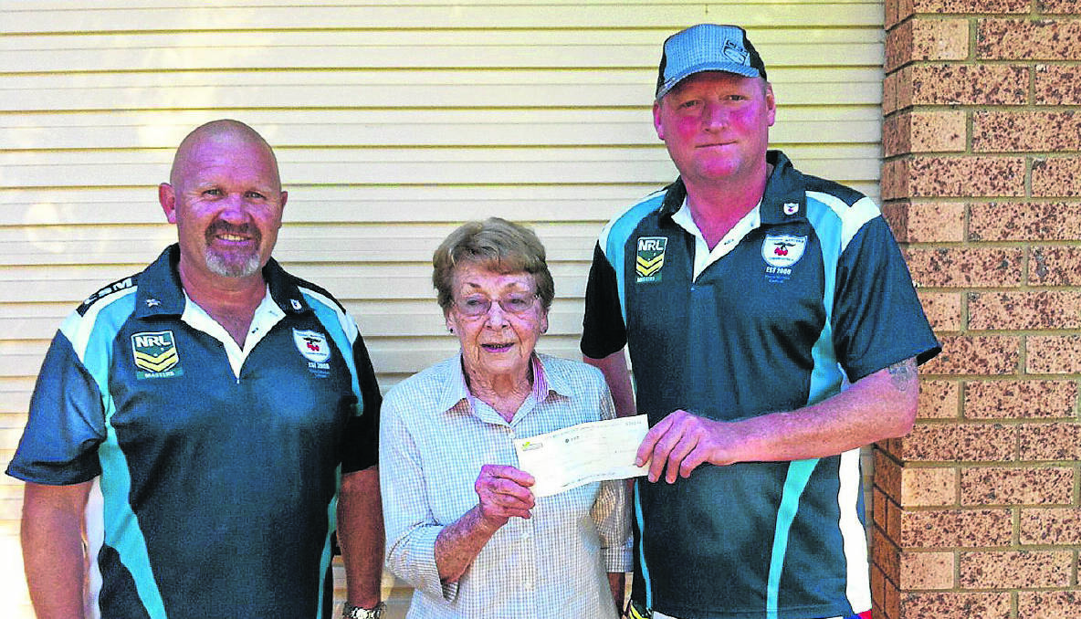 DONATION: Darren Green (left) and Ray Spring donated $500 to Riding for Disabled Association (RDA) life member Nan Terry on behalf of the Cherryatrics.   						      (sub)