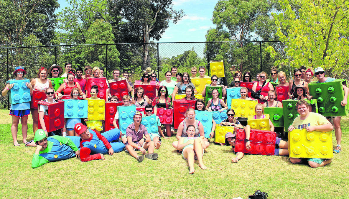 CREATIVE: Young High School’s Year 12 students of 2014 with their year advisor Ben Cooper (far right).  The students all pitched in to construct the Lego costumes.			                                                               (sub)