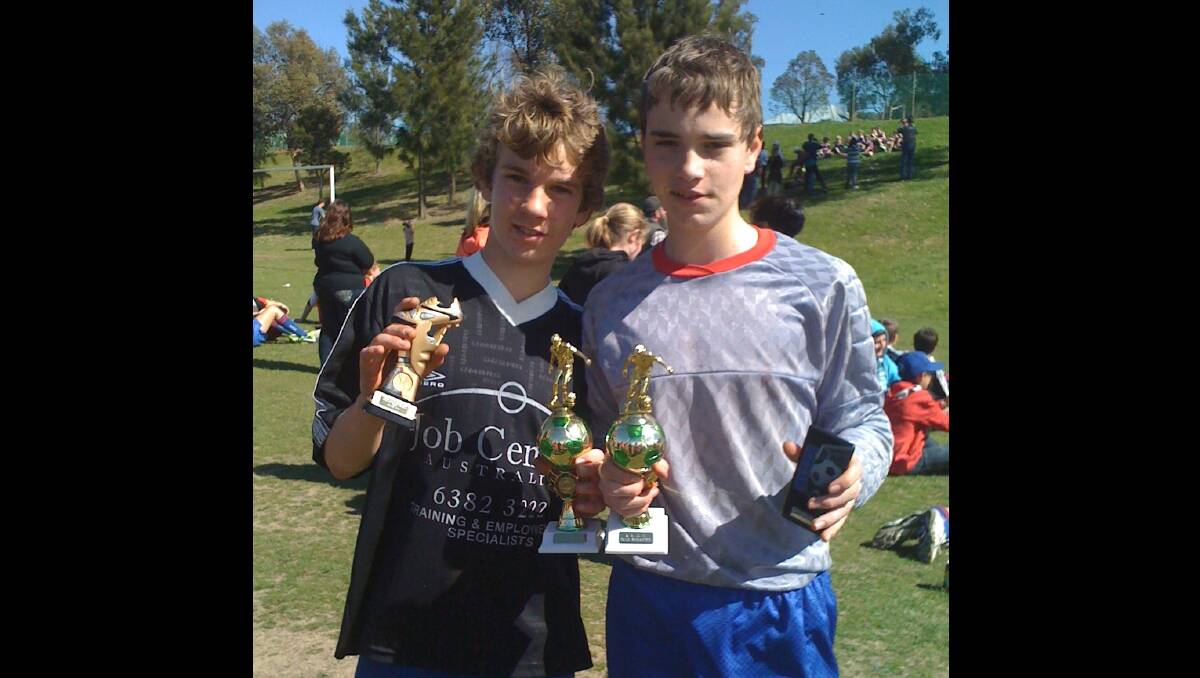 RIGHT: Under 14s grand final winner Michael Cram was named Most  Valuable Player and Xavier Higgins received the Coaches Award for Job Centre Australia.			 (sub)