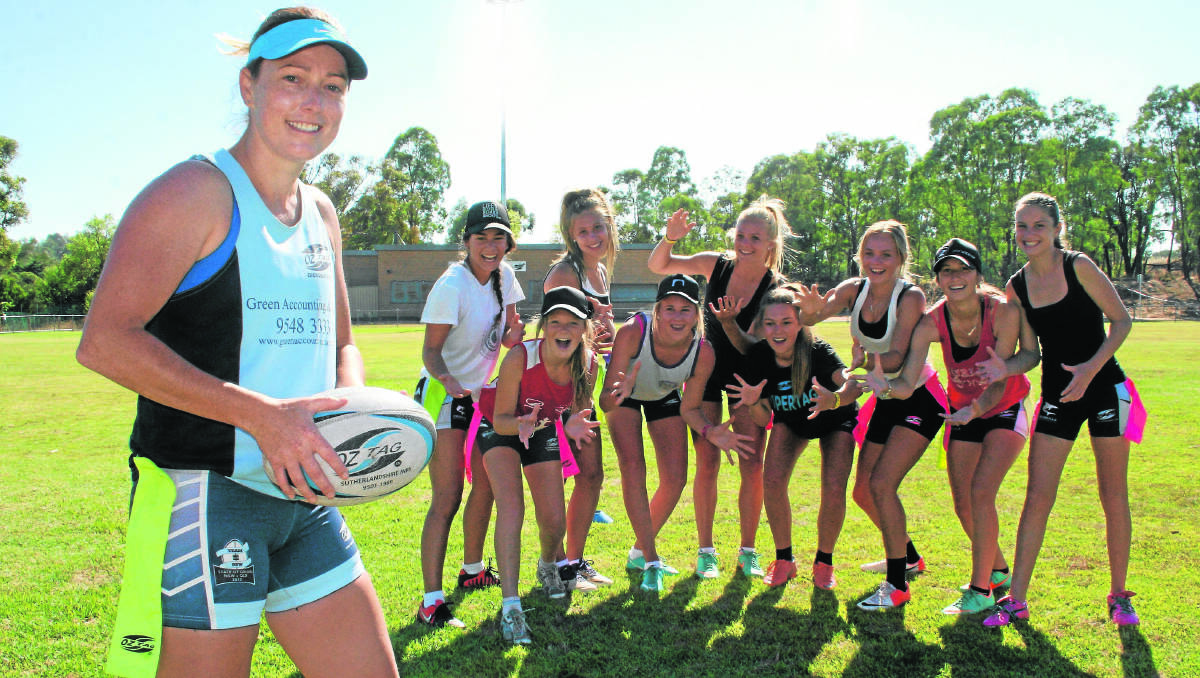 NO PLACE LIKE HOME! Australian OzTag player and former Young girl Susan Smith (front) has just returned from the OzTag World Cup in New Zealand and decided to show a group of Sydney junior OzTag players she coaches what it’s like living and training in the country.									(susan0113 01)