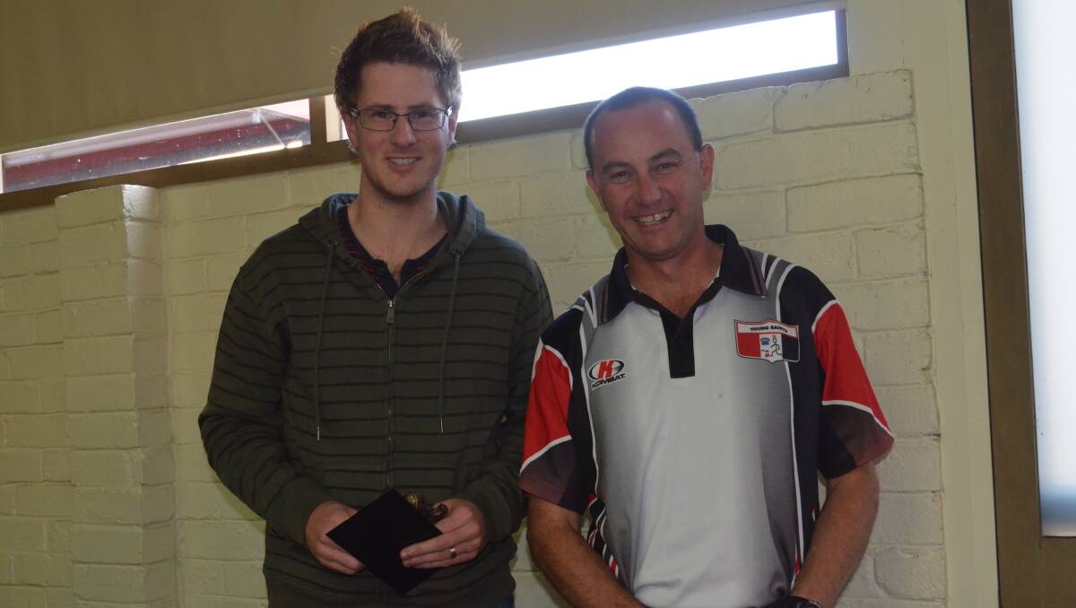 THANK  YOU (below): Club president Mark Silk (right) thanked Craig Fox for his service to the game.       (aflpres06)