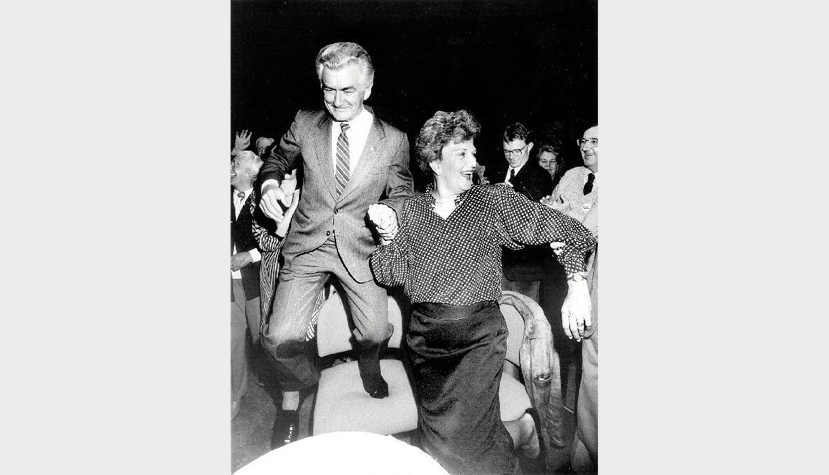 Bob Hawke celebrates his election win with wife Hazel in the ballroom at the Hyatt on Collins, 1987.