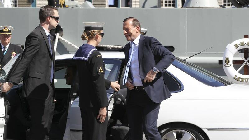 Prime Minister Tony Abbott arrives at Garden Island for the International Fleet Review in Sydney. Photo: Janie Barrett