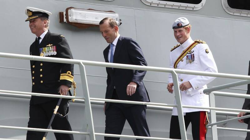 Prince Harry at the International Fleet Review with Prime Minister Tony Abbott and Fleet Commander Barrett at Garden Island, Sydney. Photo: Janie Barrett