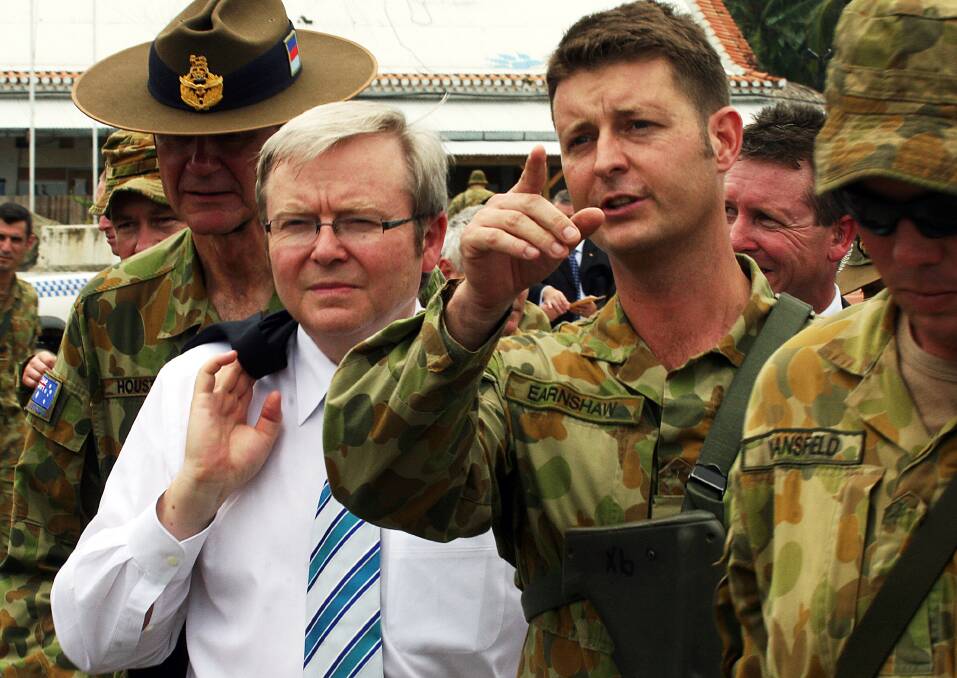 Australian Prime Minister Kevin Rudd visits Australian armed forces at the International Security Forces (ISF) at Heliport February 15, 2008 in Dili, East Timor. Photo by Luis Enrique Ascui/Getty Images