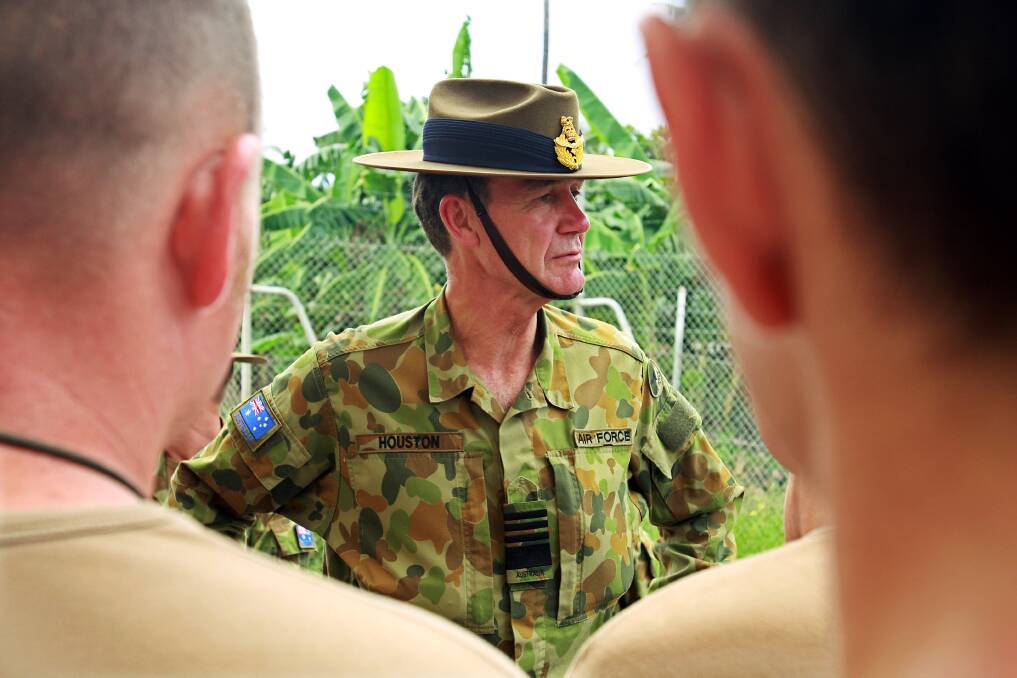Chief of the Australian Defence Forces Air Vice Marshall Angus Houston meets with Australian armed forces at the International Security Forces at Heliport February 15, 2008 in Dili, East Timor. Photo by Luis Enrique Ascui/Getty Images
