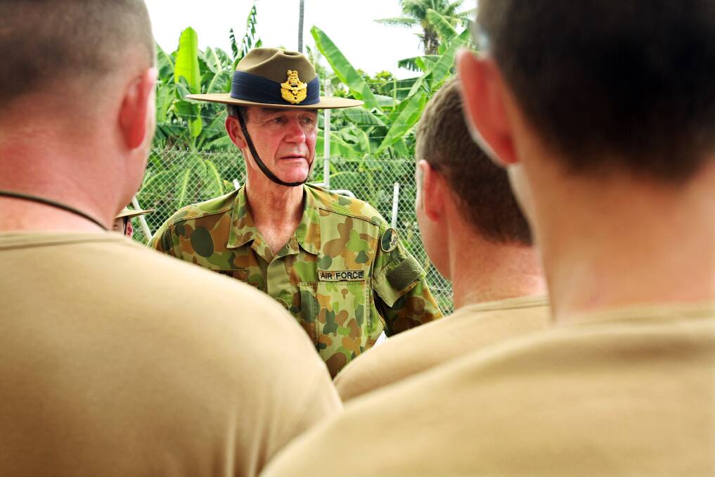 Chief of the Australian Defence Forces Air Vice Marshall Angus Houston meets with Australian armed forces at the International Security Forces at Heliport February 15, 2008 in Dili, East Timor. Photo by Luis Enrique Ascui/Getty Images