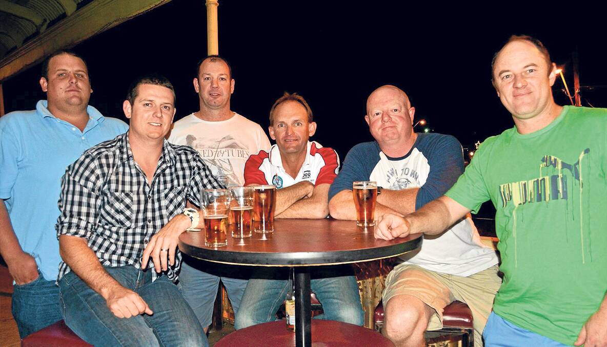FIRE AND RESCUE: Chilling outside on the balcony were Young Fire and Rescue NSW firefighters Michael Thomson, Matt McKnight, Jamie Canellis, Russell Job, Matt Dreverman (deputy captain) and Shaun Rolfe.