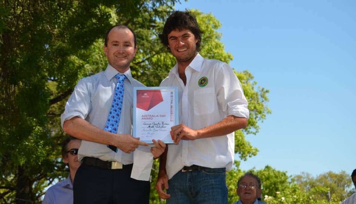 SENIOR SPORTSPERSON: Councillor Ben Cooper presented clay target shooter 19-year-old Matt Schiller with the prestigious title of Young’s Senior Sportsperson of the Year award during the Australia Day celebrations in Carrington Park on Saturday.     