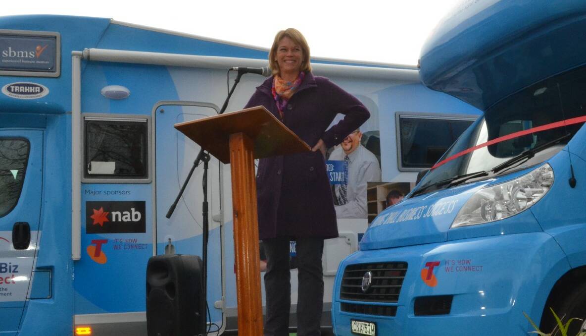 LAUNCH: Minister for Small Business Katrina Hodgkinson speaking at the Small Biz Bus launch in Anderson Park, Young on Wednesday.