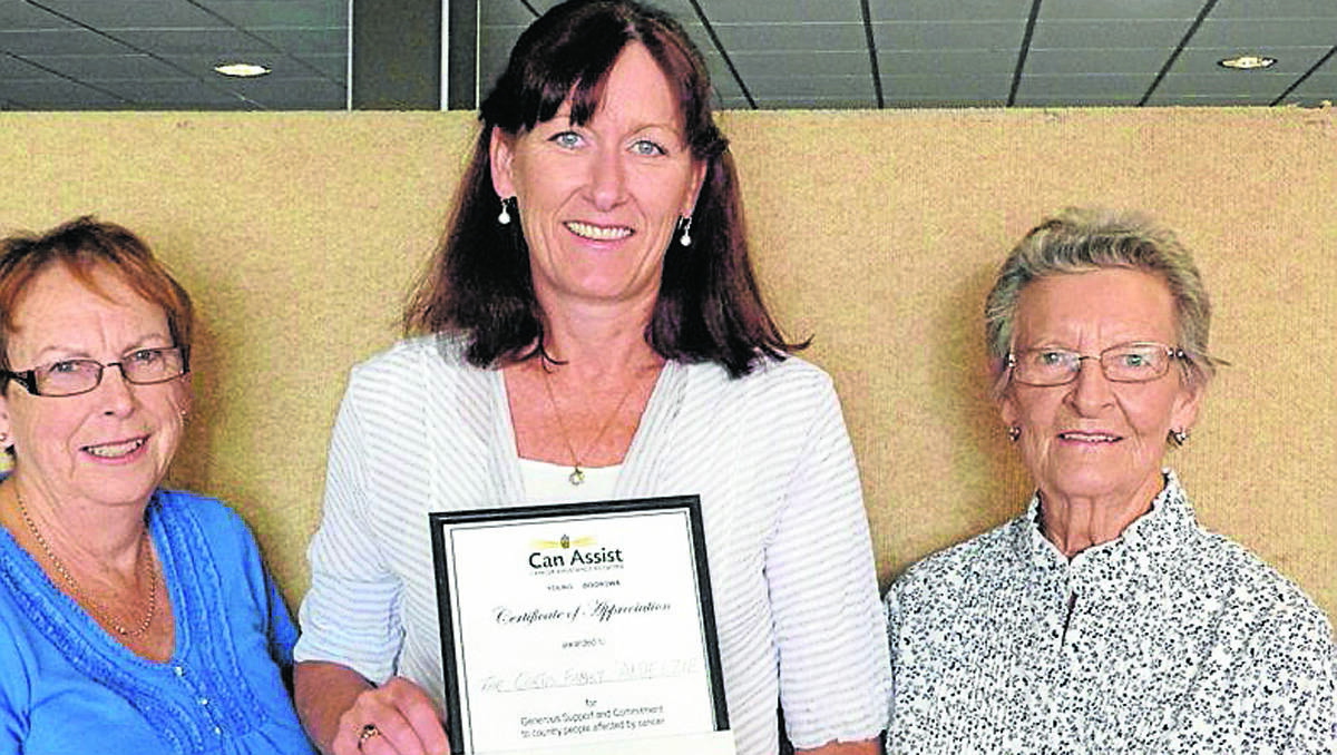 THANKS: Karen Curtis was also presented with a certificate of appreciation by (left) Sandra Holmes and Doris Arneill (right).