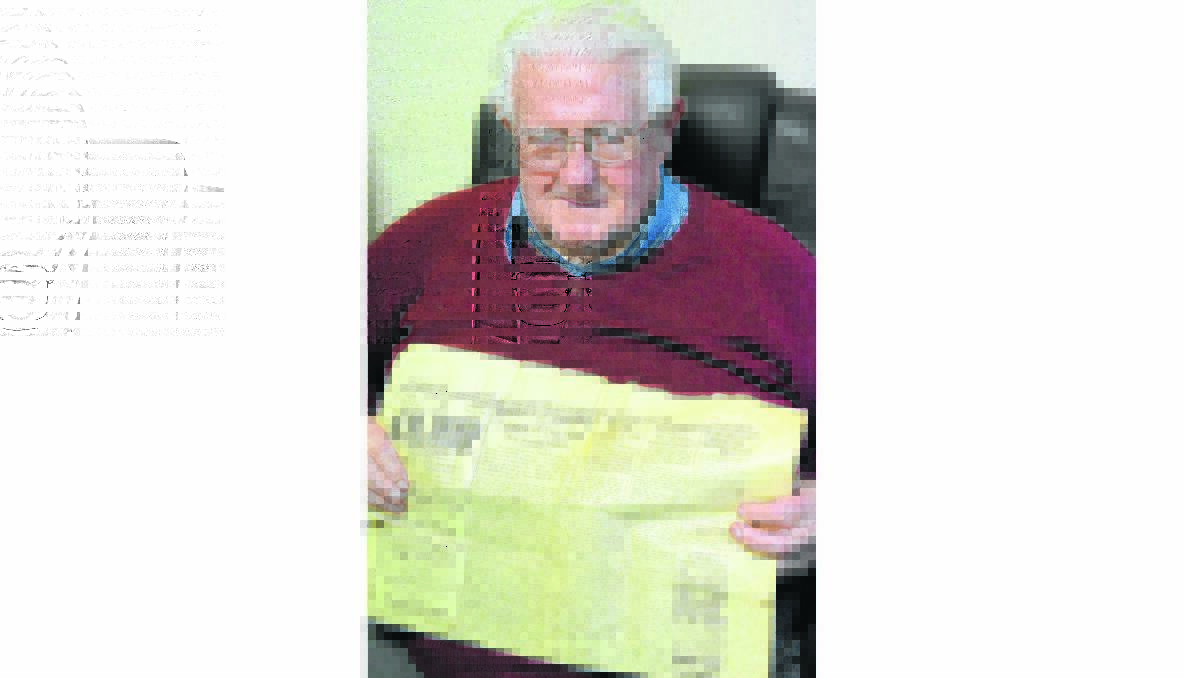 PROUD: John McGregor with the Young Chronicle article detailing his father’s wartime exploits. 