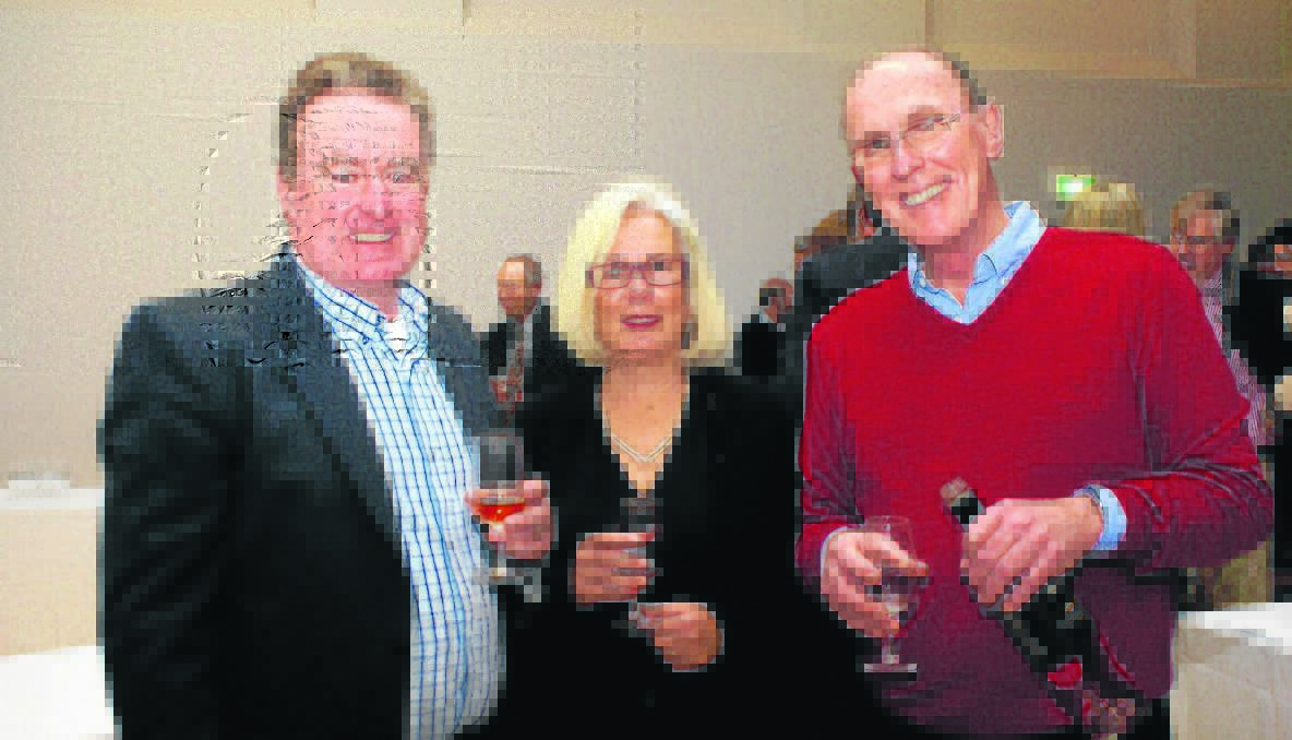 SOCIAL: Greg and Fiona Quirk of Wallendbeen with Brian McLeod of Wombat at the annual Hilltops Wine Dinner. Photo: Paul Neville