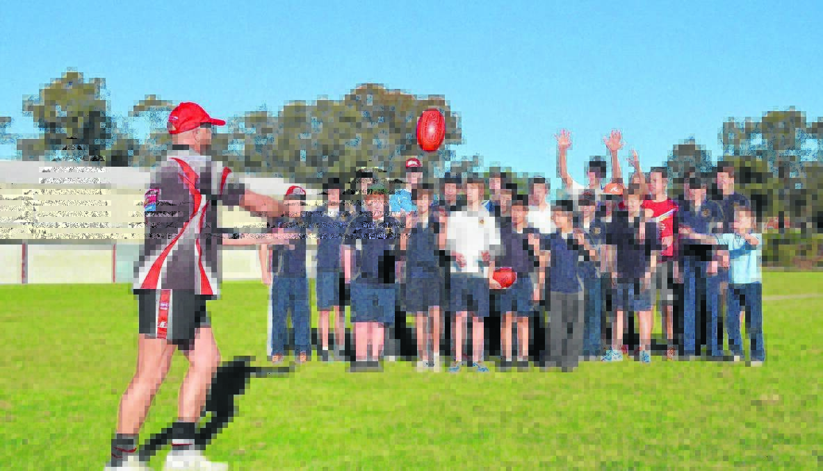 NEW COMP: Young High School students are on board with a new incentive - an annual AFL match between the high school and Hennessy Catholic College - kick-started by local AFL coach Geoff Harmer and members from the Young Saints AFL Club to grow AFL in Young. 