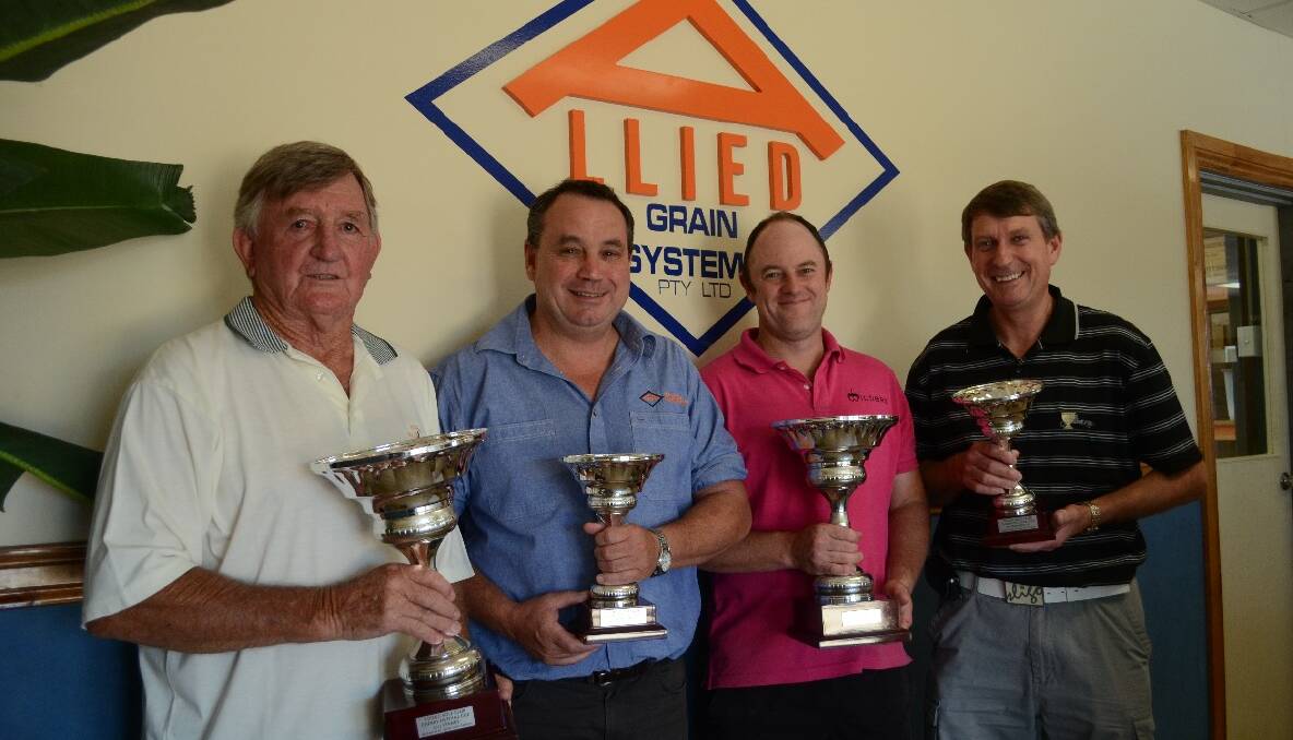 CHERRY CUP: Barry Hazelgrove, Allied Grain Systems owner John White, Young Golf Club captain Shaun Rolfe and Club Professional Phil Cartwright with trophies for the Cherry Festival Golf Day donated by Allied Grain Systems.