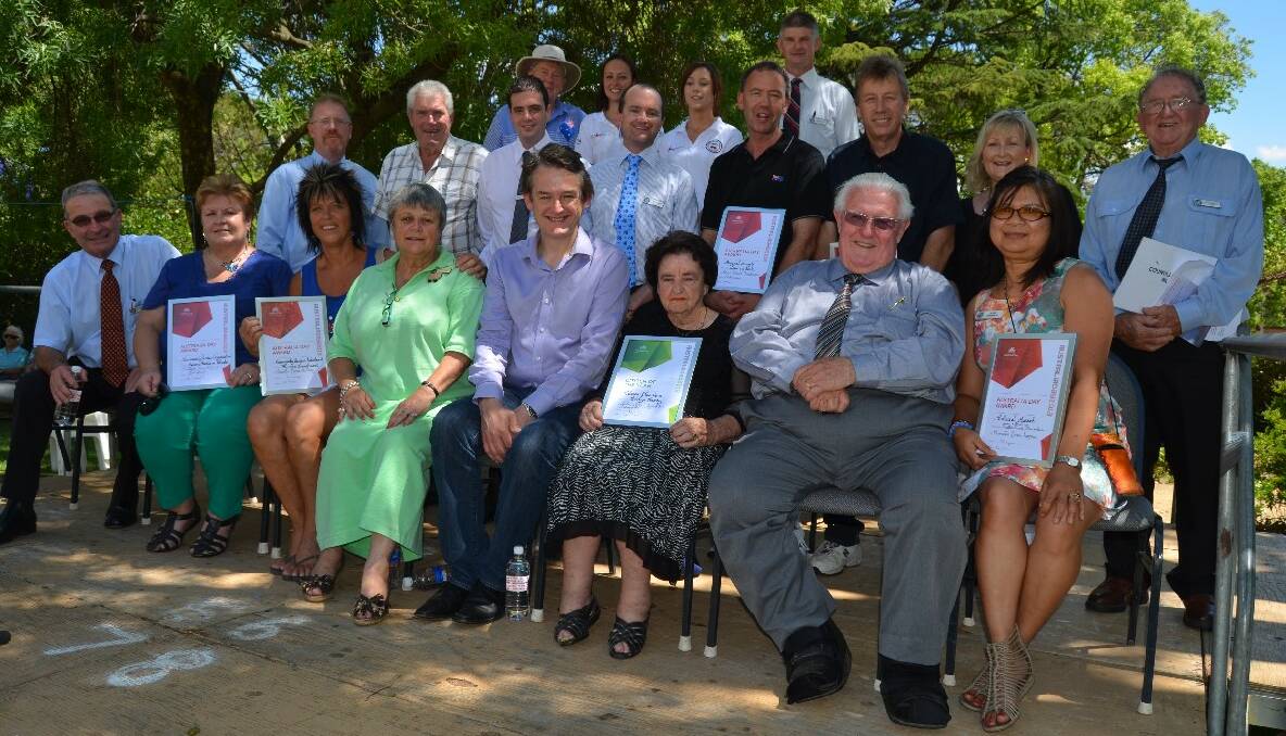 AWARD WINNERS: Several of the Australia Day award winners in Young pictured with councillors, Young's Visitor Information and Tourist Centre staff, Australia Day ambassador Jon Dee (centre) and event MC Greg Broderick (far right).