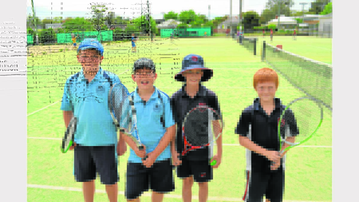 HAVING A GO! Dylan Harmelink and Jesse Thomson-Jones from Maimuru Public School, and Charlie Newell and Gage Johnson of Bribbaree Public were among the 40 students who got in and had a go in the Small Schools Tennis Championships on Friday. 