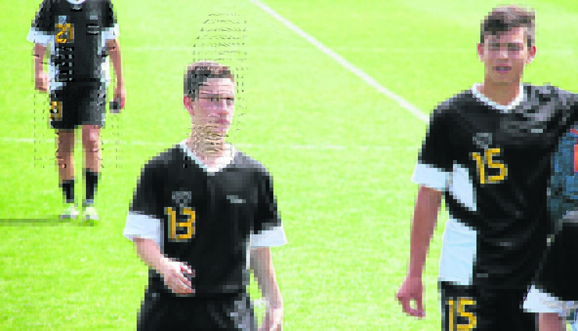 NEXT STEP: Perhaps one of the best Christmas presents for 14-year-old Malcolm Ward (left) was receiving a phone call from ex-socceroo Tony Vidmar telling him Football Federation of Australia was offering him a scholarship into the Under 17s Centre of Excellence at the Australian Institute of Sport. 