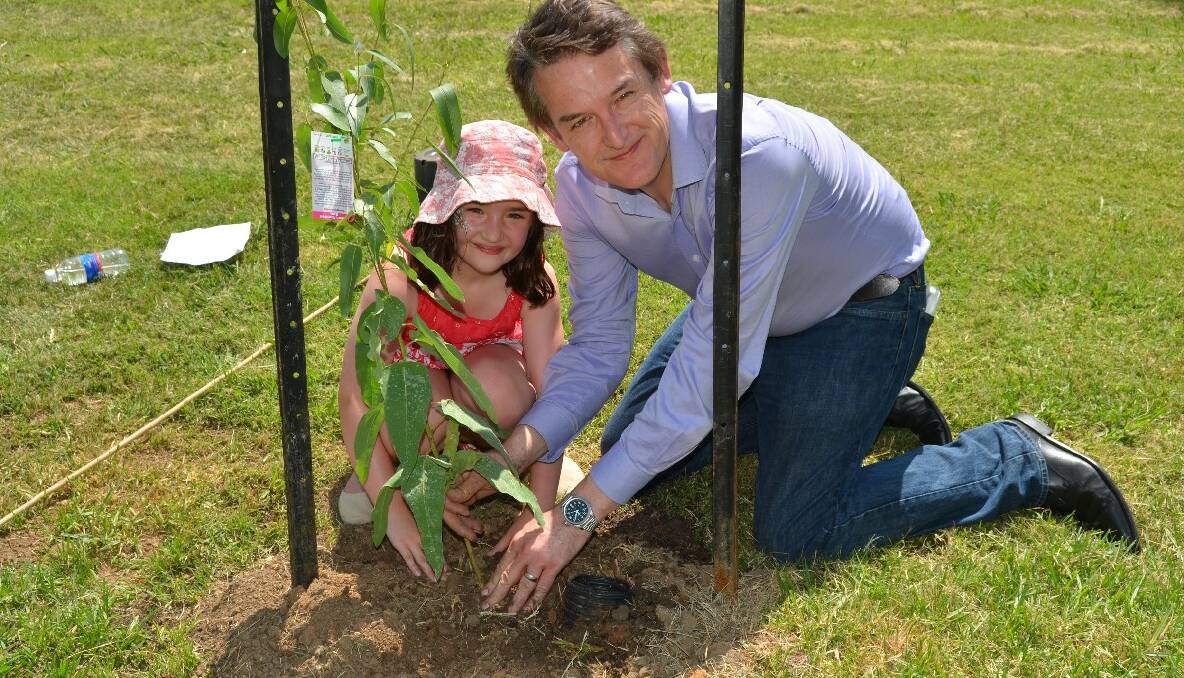 TREE PLANTING: Father and daughter, Jon and Estelle Dee had the honour of planting a tree along Burrangong Creek as part of an annual tradition during Young’s Australia Day celebrations. 