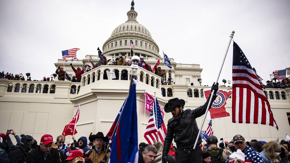 Pro-Trump supporters storm the US Capitol following a rally with President Donald Trump on January 6, 2021 in Washington, DC. Picture: Getty Images