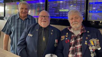 Lyn Orford (right) and two other 'stokers' who served in the Navy during the Vietnam War
