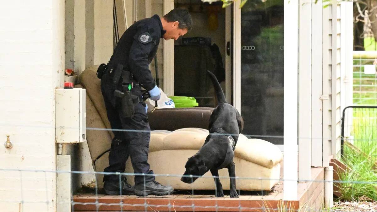 Technology detector dogs search Erin Patterson's Leongatha home. Picture James Ross/AAP