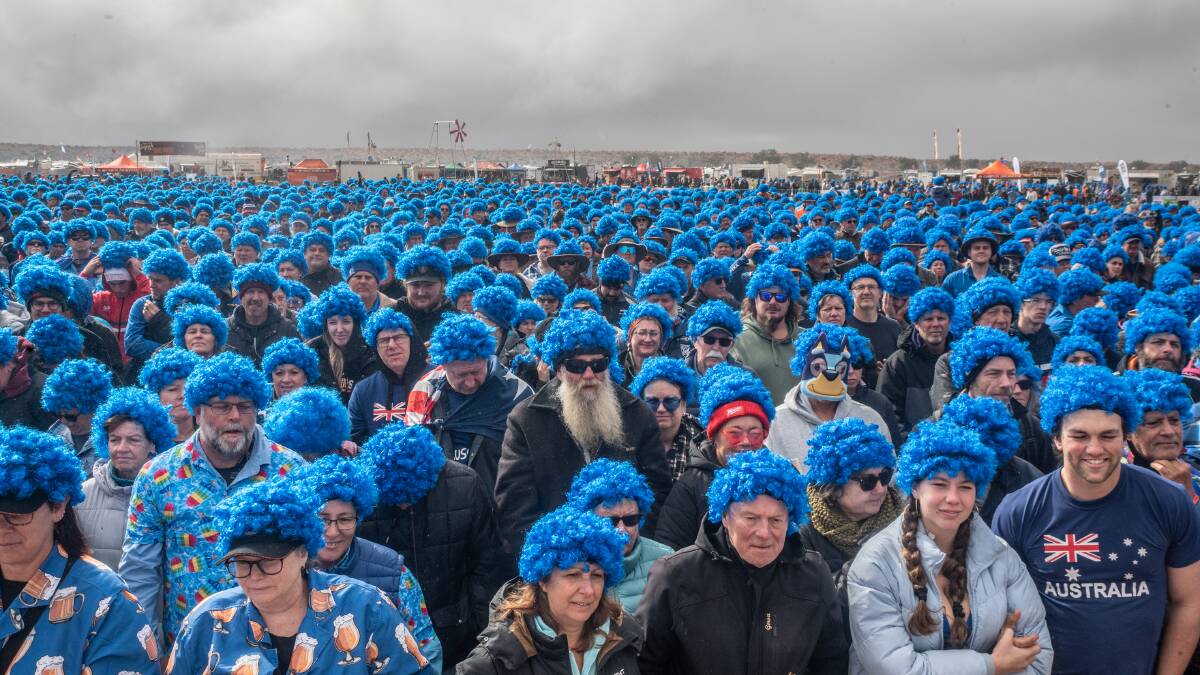 Festival goers deck out in blue wigs to raise money for type 1 diabetes research and a world record attempt. Picture by Neil Donovan