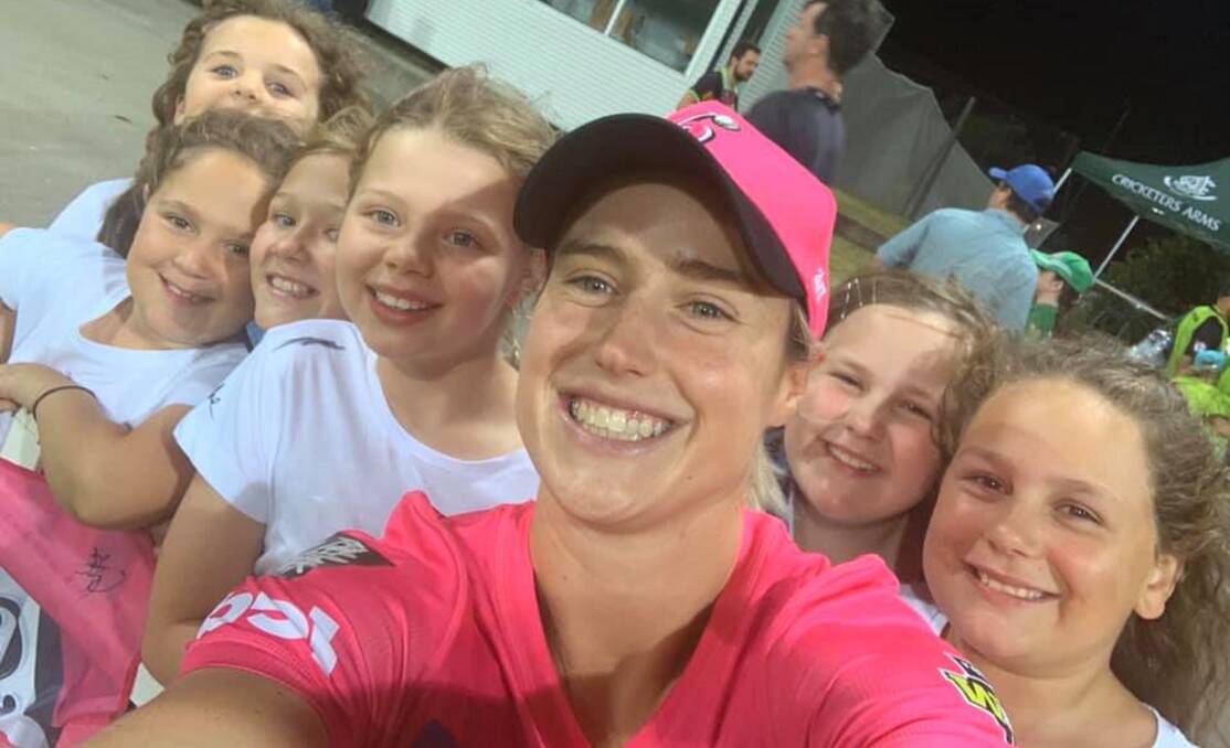 Star power: Ellyse Perry takes a selfie with a contingent of youth super fans from Maitland.