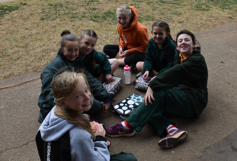 EXCITED: Dana, Maddie, Zara, Maddie, Molly and Zara are all excited to see each other when school is back to normal.