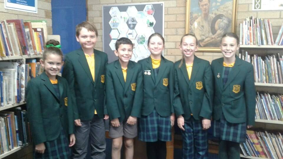 The winning Young Public School's winning debating team the 'Cherrypickers' were very happy with their success.
