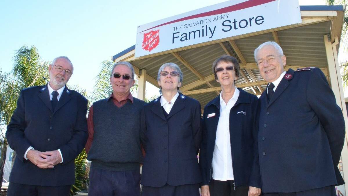 Laurie Anderson, then mayor Stuart Freudenstein, Fiona Anderson, Jan Cairns and Lieutenant Colonel Philip Cairns at the official opening of the family store in 2013.