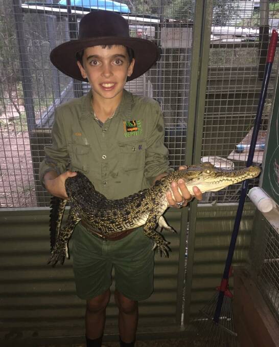 SMILE FOR THE CAMERA: Noah spent his holidays working with reptiles.