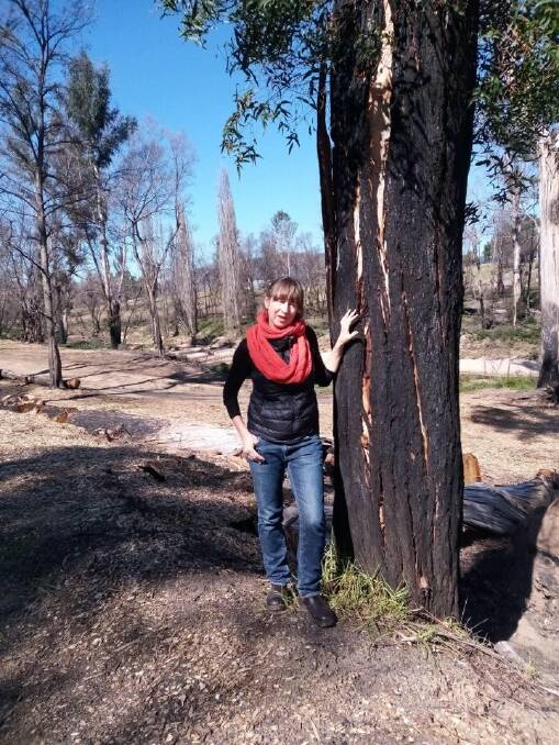 Cecile Bower next to the creek where she hid during the Cobargo fires. Photo: Supplied