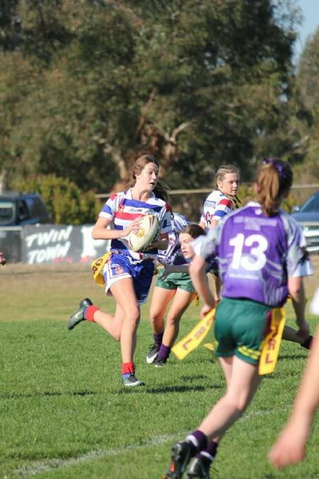 RUN WITH IT: Molly Hogan was one of three girls from Young selected to play in the Group Nine Under 16s League Tag side. Photo: YJRL/Facebook.