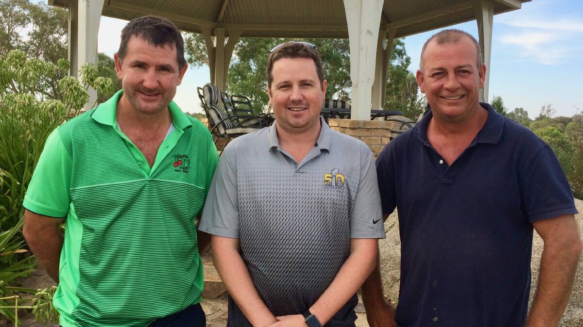 HAVING A BALL: Terry Brothers Carpet Court Four ball best ball winners Craig Taylor (left) and Trent McCann (right) with sponsor Ryan Terry (middle).