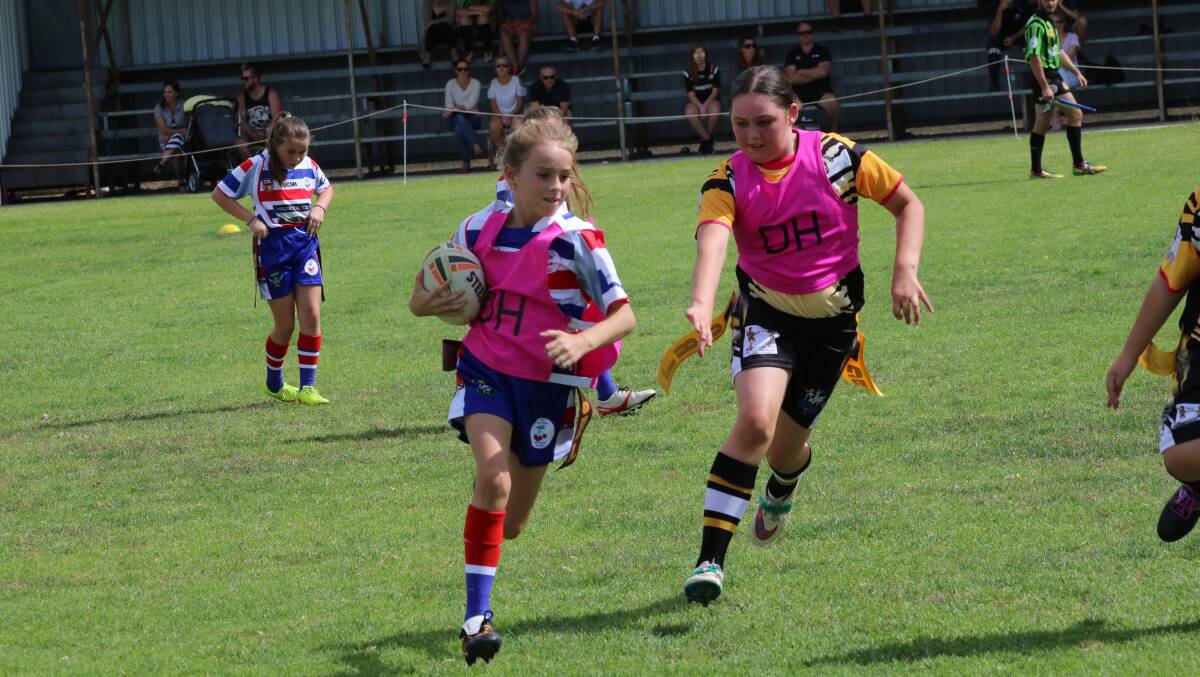 Sprinting for a try during the Young girl's League Tag game against Gundagai. 