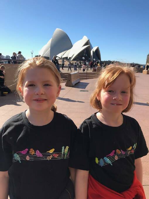 SING IT LOUD: Chloe and Sophie Worner-Tomlinson sang their hearts out to a 2700 person crowd at the Sydney Opera House.
