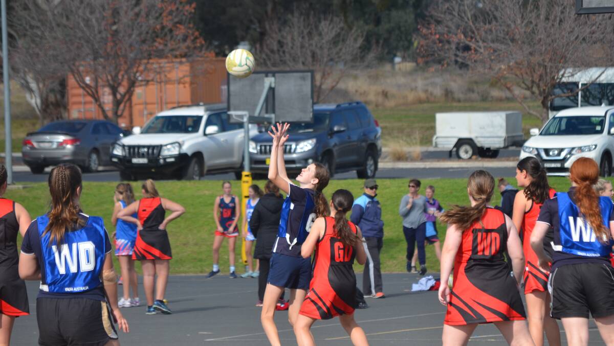 Marlie McIntosh has the ball in her sights during Young High School's game against Boorowa.