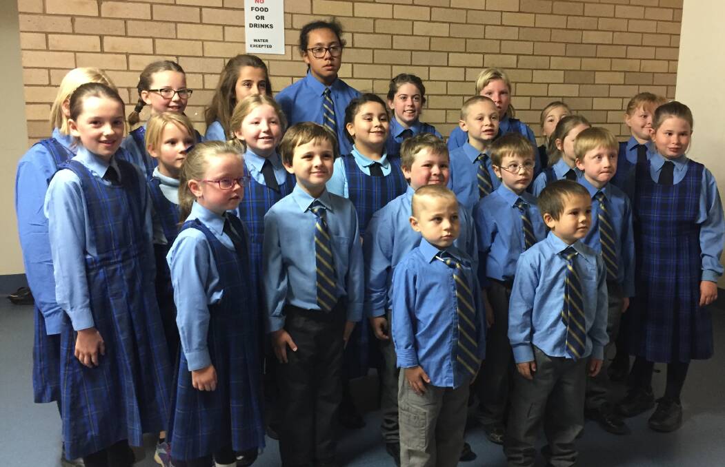 READY AND WAITING: The whole of Monteagle Public School waiting to perform at the Cowra Eisteddfod.