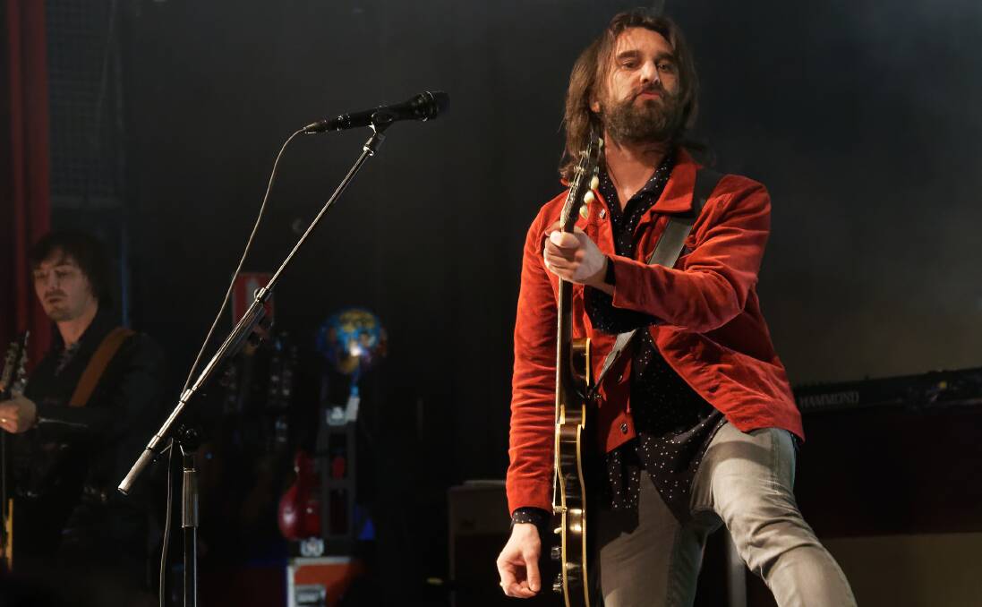 RE-BORN: Nic Cester on stage with Jet in Newcastle in 2018. Picture: Paul Dear