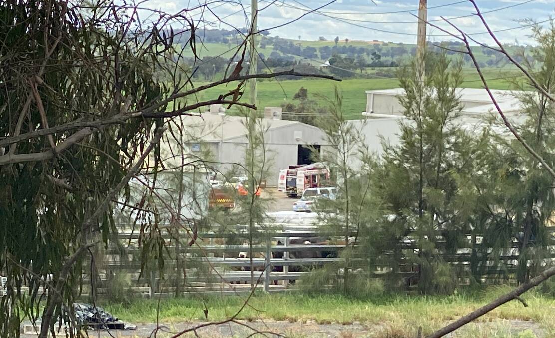 Emergency services on site at an abattoir in Young, where a man has been caught in machinery. Picture: Young Witness